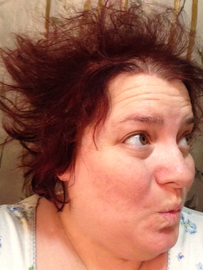 Michelle looking off to the side with epic bedhead
