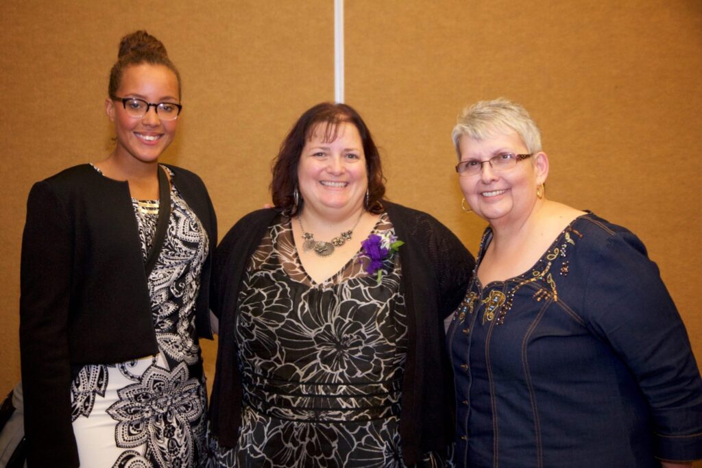 Michelle (center) with her daughter, Lydia (left) and mother (Sue) on the right.