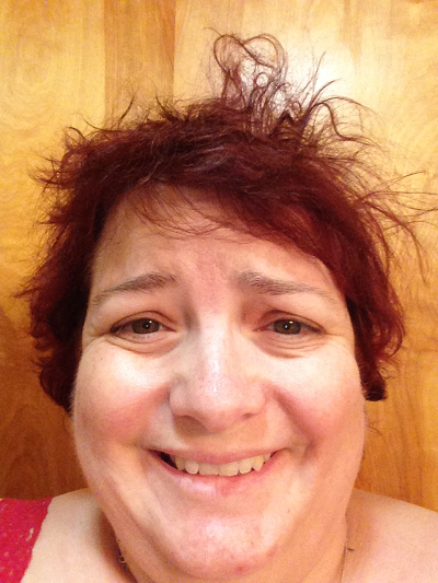 Michelle laughing at some pretty messy bedhead