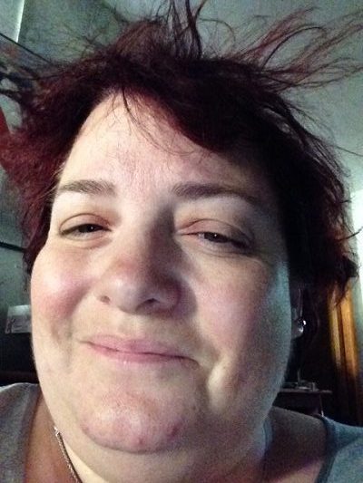 Michelle smiling at her bedhead