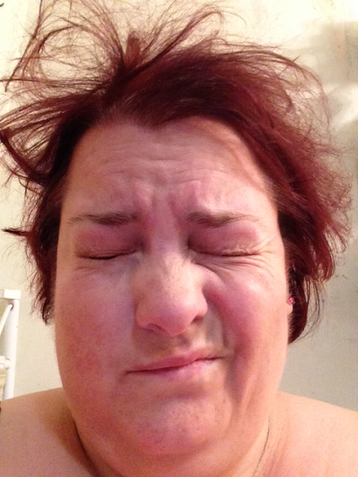Michelle (with bedhead) squinting at the light