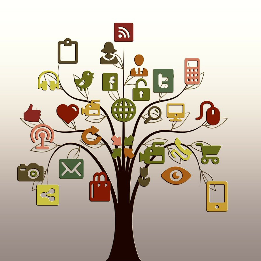 A tree with various social and web icons hanging from its branches